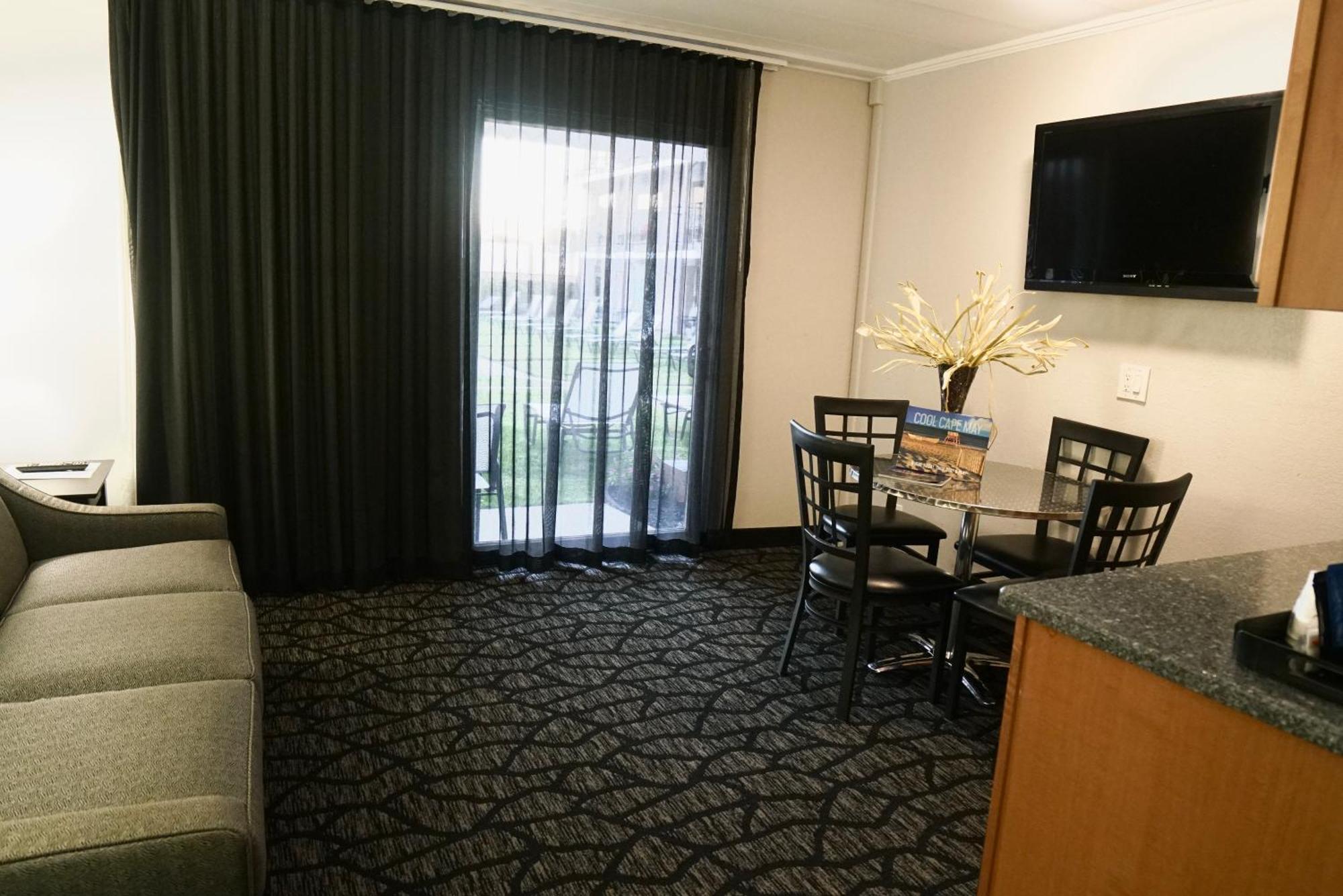 E-3 Kitchenette One Bedroom One Queen Bed One Single Bed One Sofa Bed